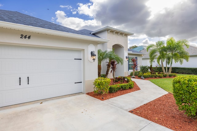 view of front of home with a garage