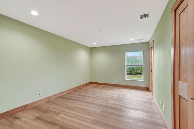 empty room featuring light hardwood / wood-style floors