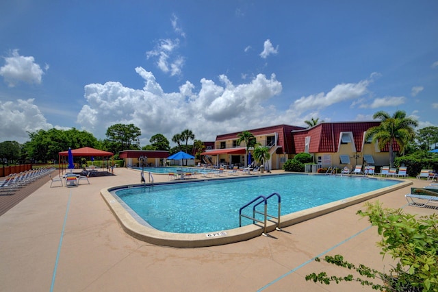 view of pool featuring a patio and a gazebo