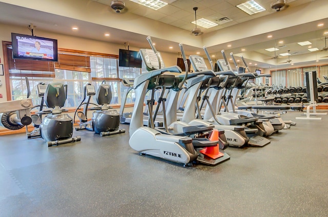 workout area with a drop ceiling