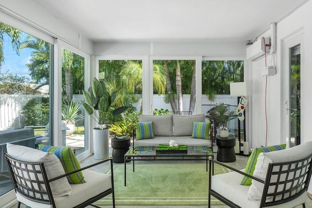 sunroom / solarium featuring a wall unit AC