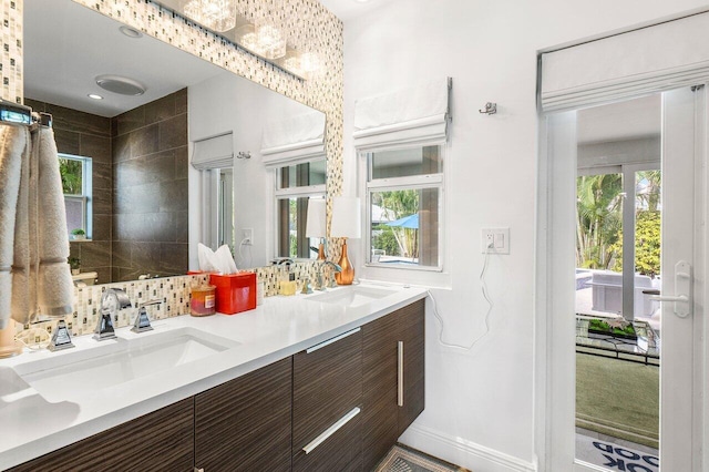 bathroom with vanity and backsplash