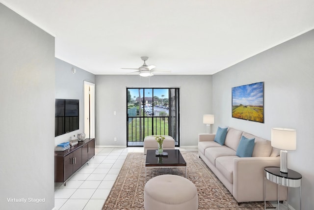 tiled living room with ceiling fan