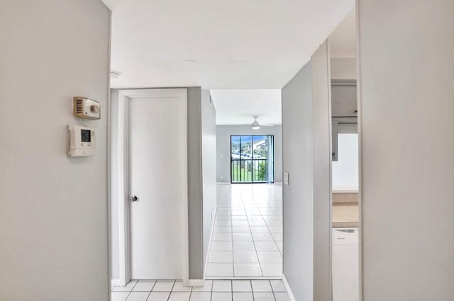 corridor with light tile patterned floors