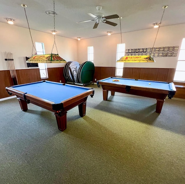 recreation room with carpet floors, billiards, wood walls, and ceiling fan