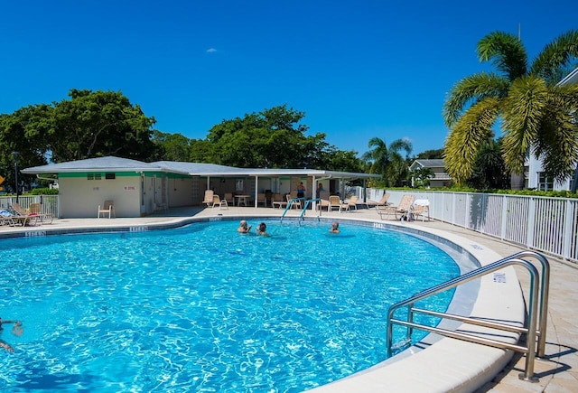 view of swimming pool featuring a patio area