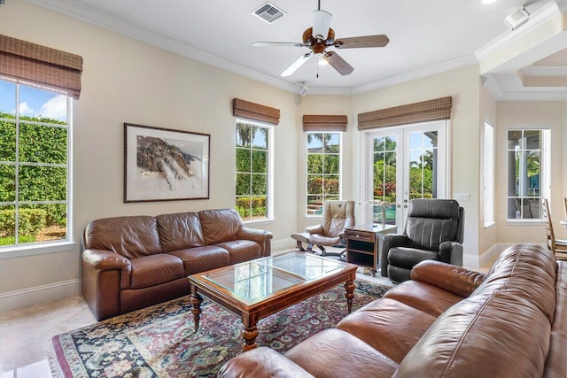 tiled living room featuring french doors, ceiling fan, and crown molding