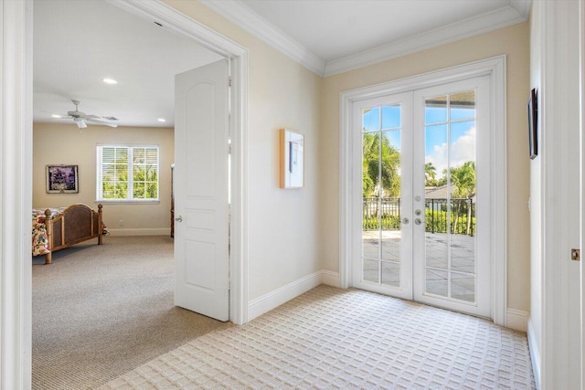 entryway with french doors, light carpet, and a healthy amount of sunlight