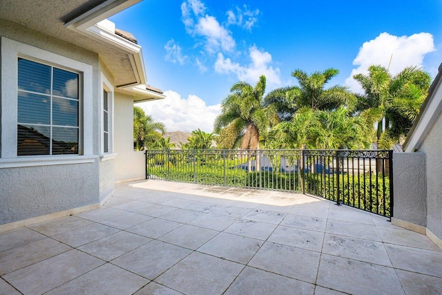 view of patio / terrace with a balcony