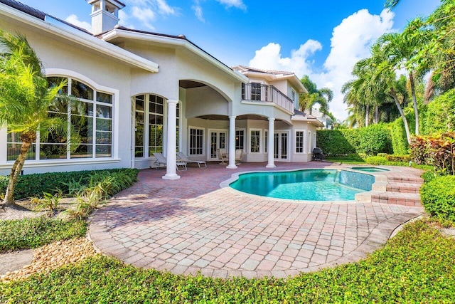 view of pool with a patio