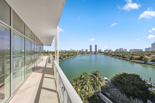 balcony featuring a water view