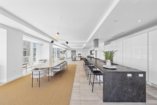 kitchen featuring white cabinetry and a center island