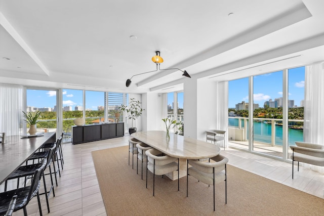 dining room with a water view