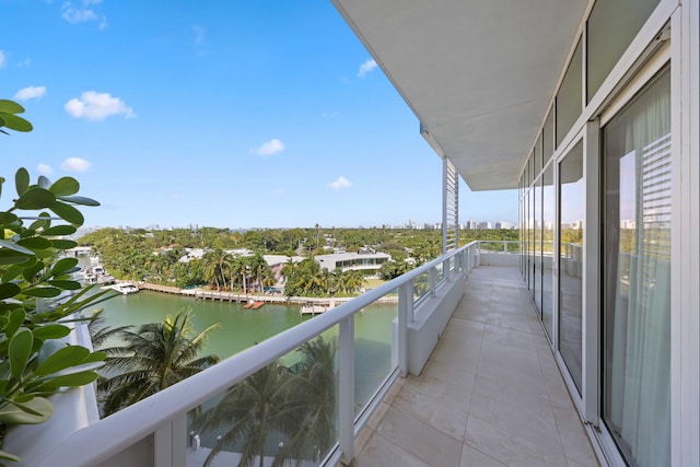 balcony featuring a water view