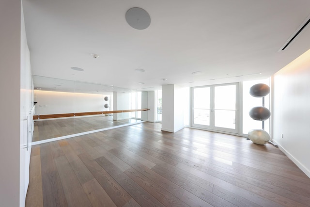 exercise room featuring hardwood / wood-style flooring