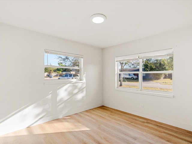 empty room with light wood-type flooring