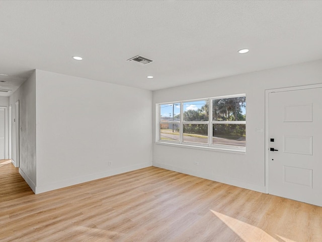 entrance foyer with light hardwood / wood-style flooring