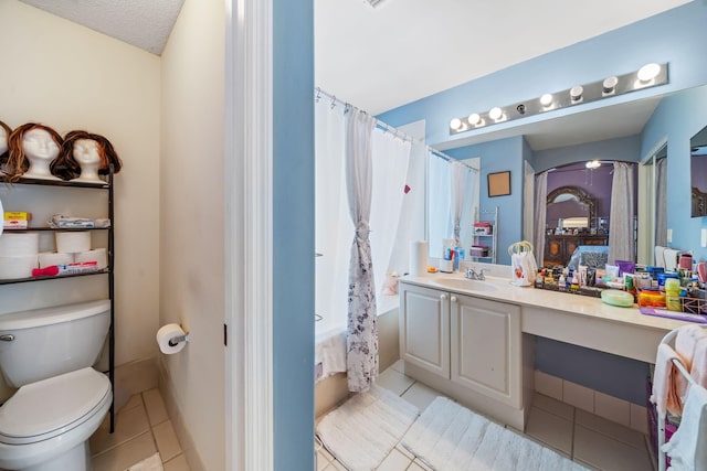 full bathroom with shower / bath combo, tile patterned flooring, vanity, and toilet