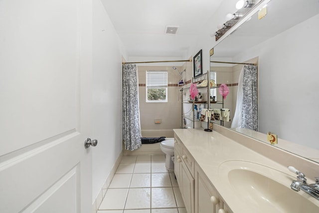 full bathroom featuring toilet, vanity, shower / bath combination with curtain, and tile patterned floors