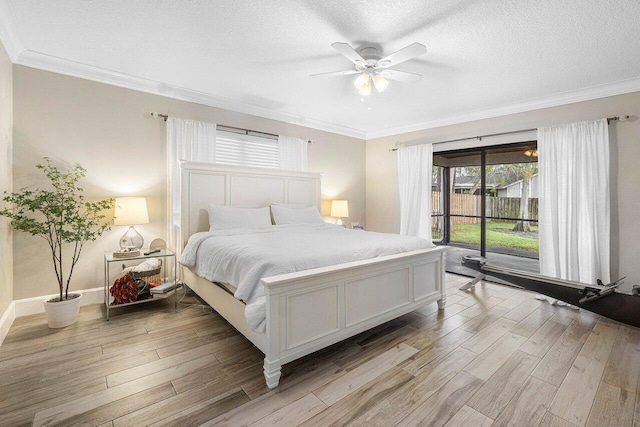 bedroom with ceiling fan, light hardwood / wood-style flooring, crown molding, a textured ceiling, and access to outside