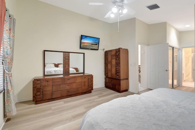 bedroom with ceiling fan and light hardwood / wood-style flooring