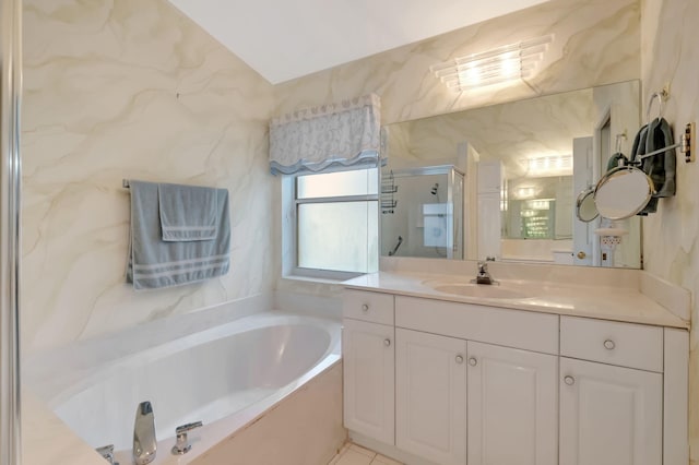 bathroom with plus walk in shower, vaulted ceiling, and vanity