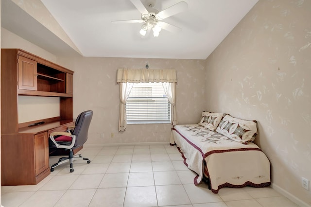 bedroom featuring ceiling fan and built in desk