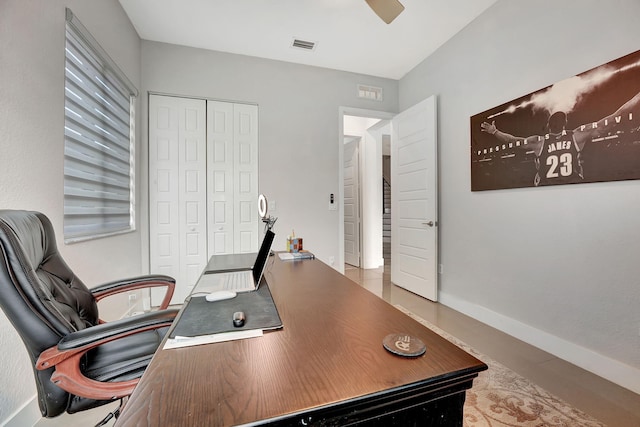 home office with light tile patterned floors