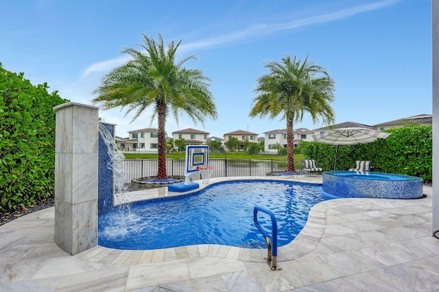 view of swimming pool featuring an in ground hot tub, a patio area, and pool water feature