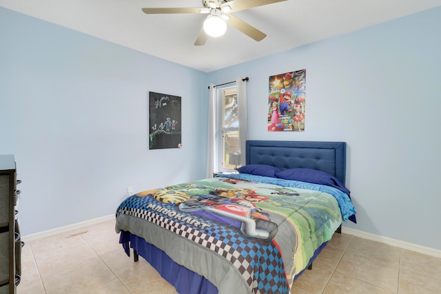 bedroom with tile patterned floors and ceiling fan