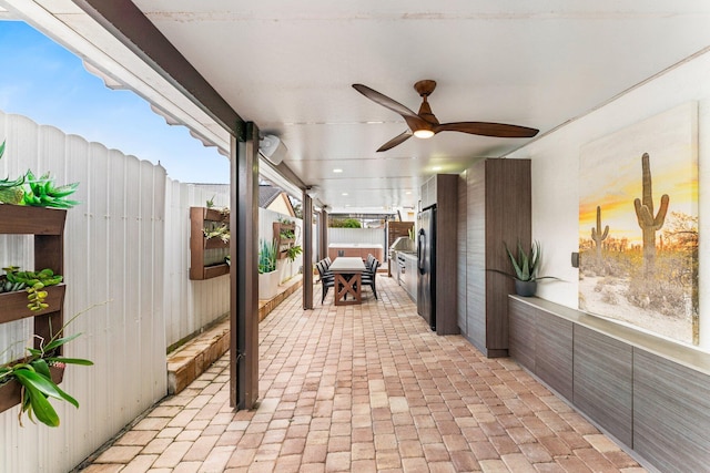 view of patio with ceiling fan