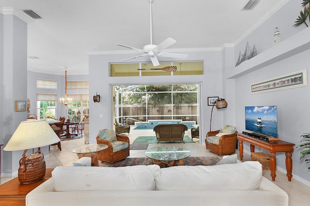 living room featuring tile patterned flooring, visible vents, ceiling fan with notable chandelier, and crown molding