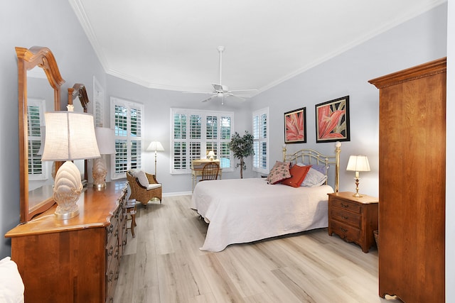 bedroom featuring baseboards, ornamental molding, a ceiling fan, and light wood finished floors