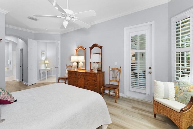 bedroom featuring light wood-type flooring, visible vents, access to outside, arched walkways, and crown molding