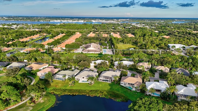 aerial view featuring a residential view and a water view