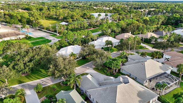 bird's eye view with a residential view and a view of trees