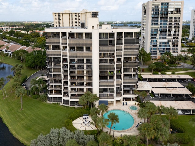 view of property with a community pool