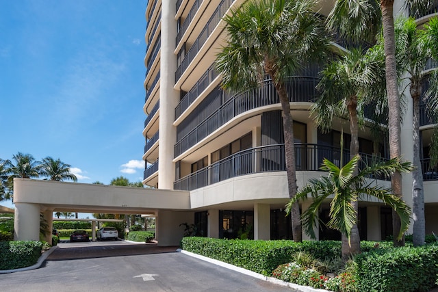 view of building exterior with a carport