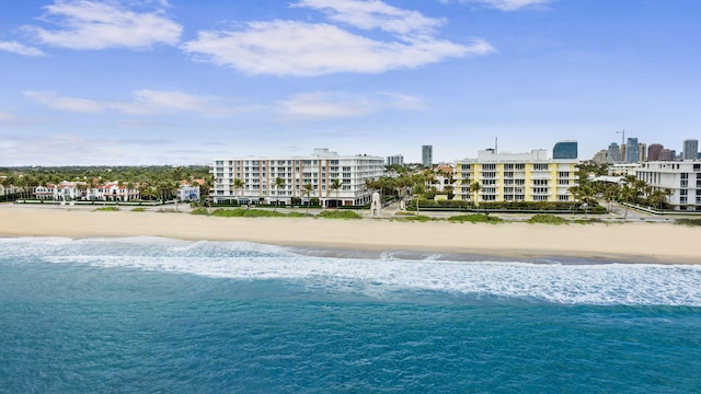 aerial view featuring a water view and a beach view