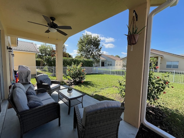 view of patio with outdoor lounge area and ceiling fan