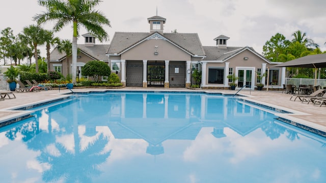 view of pool featuring a patio area