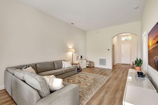 living room with light hardwood / wood-style floors