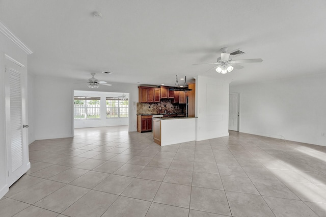 unfurnished living room with light tile patterned floors and ceiling fan