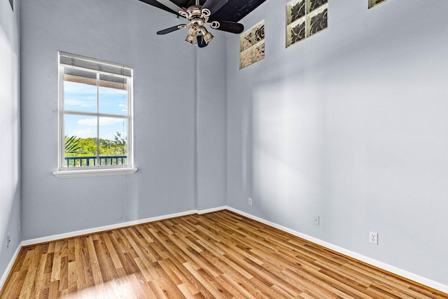 empty room with light hardwood / wood-style flooring and ceiling fan