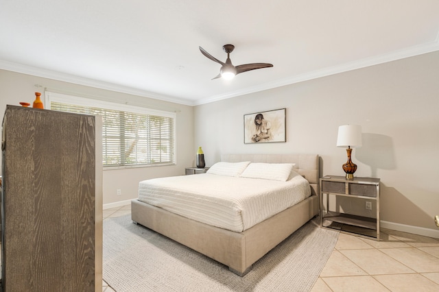 tiled bedroom featuring ornamental molding and ceiling fan