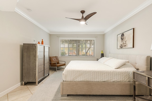 bedroom featuring ceiling fan, crown molding, and light tile patterned floors