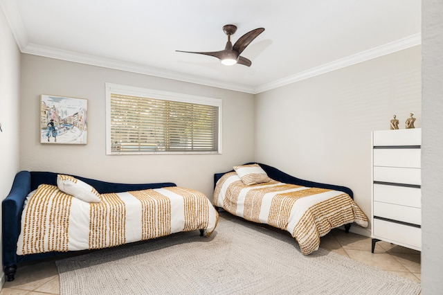 bedroom featuring ceiling fan, crown molding, and light tile patterned floors