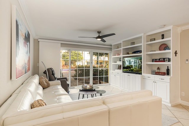 living room with light tile patterned flooring, ceiling fan, and ornamental molding