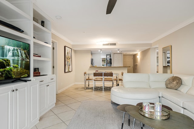 living room with ceiling fan, light tile patterned floors, and ornamental molding