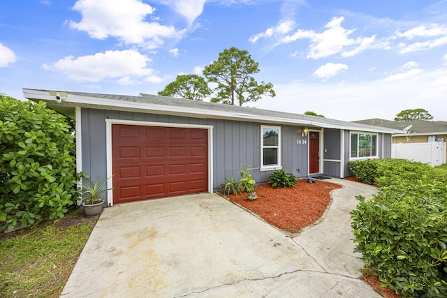 ranch-style house featuring a garage